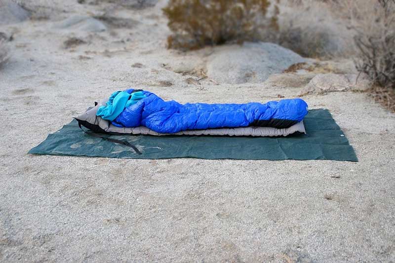 A-Camper-slept-in an-air-mattress over a mat