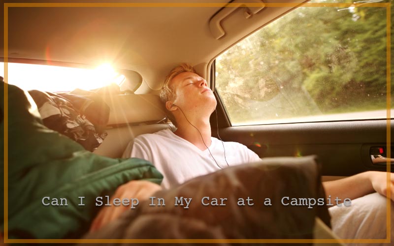 Teenager Sleeping In the Car at a Campsite